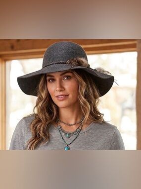 Feather detail high fashion hat